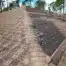 Damage from storms on a a residential home's shingle roof.